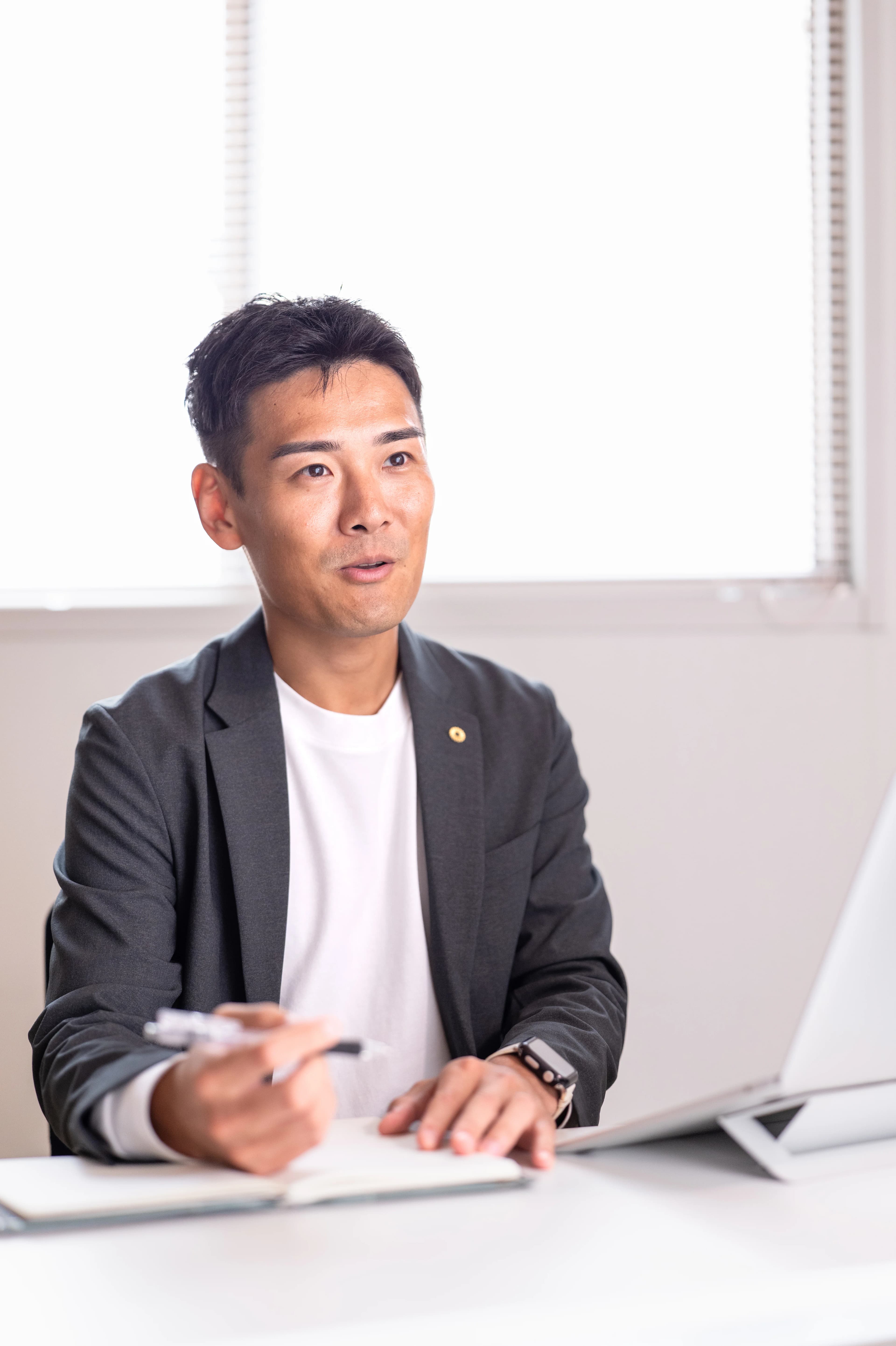 相談を受ける代表 竹内元紀